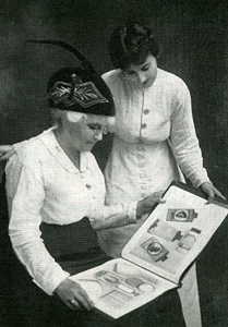 Depot Agent and customer viewing a 1916 Color Plate Catalog