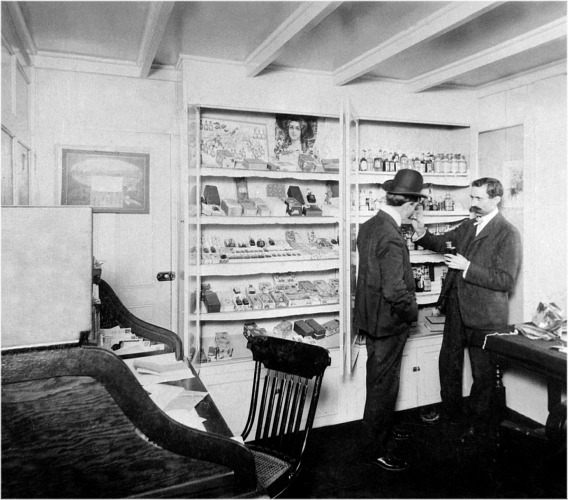 George McConnell Demonstrating Customer Goetting Perfumes